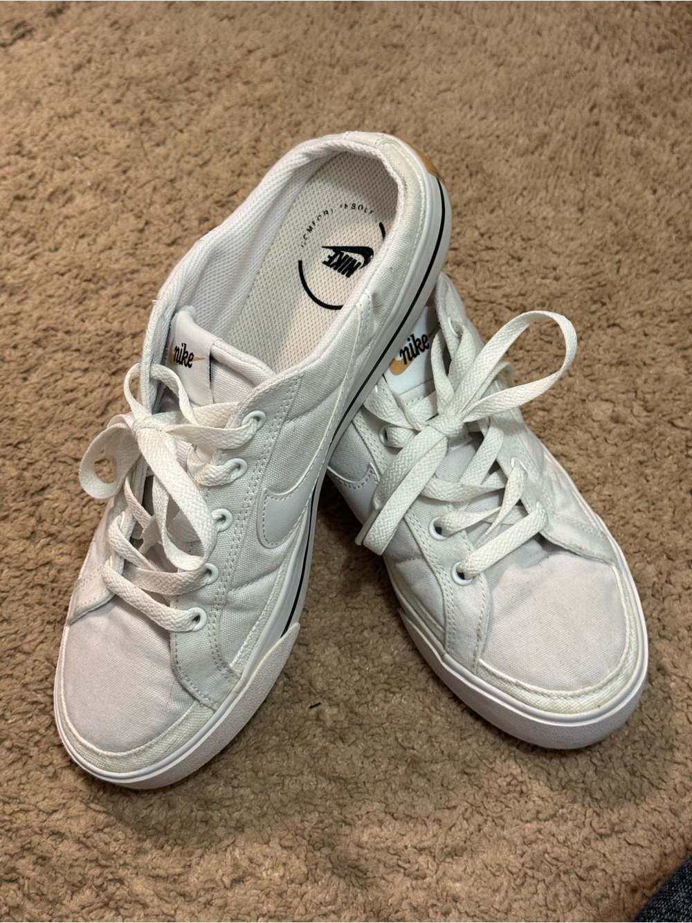 Nike Women’s White Canvas Low-Top Sneakers with Subtle Black Accents